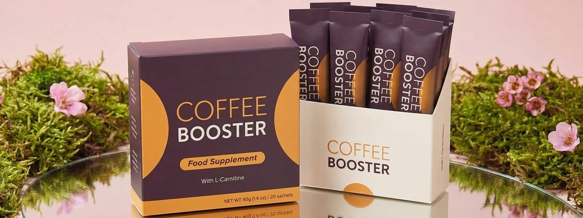 Geöffnete Coffee Booster Packung mit daneben aufgereihten vorportionierten Beuteln